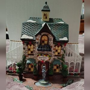 Charming Holiday Village House with Green and White Accents